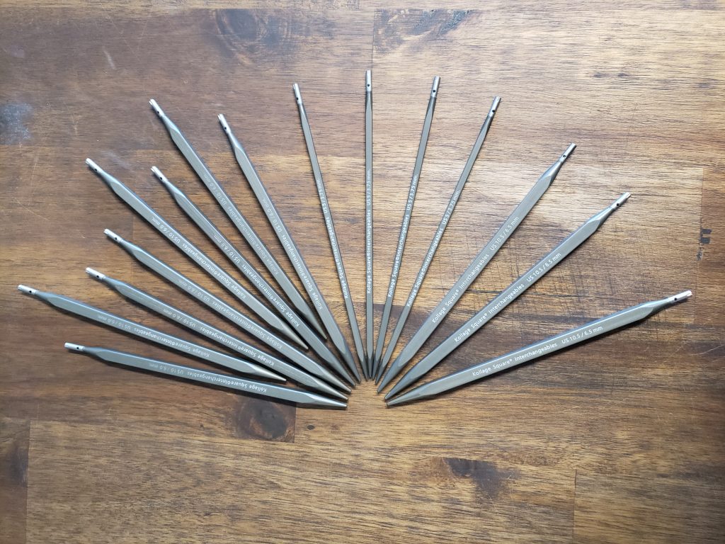 needle tips arranged on a wood table