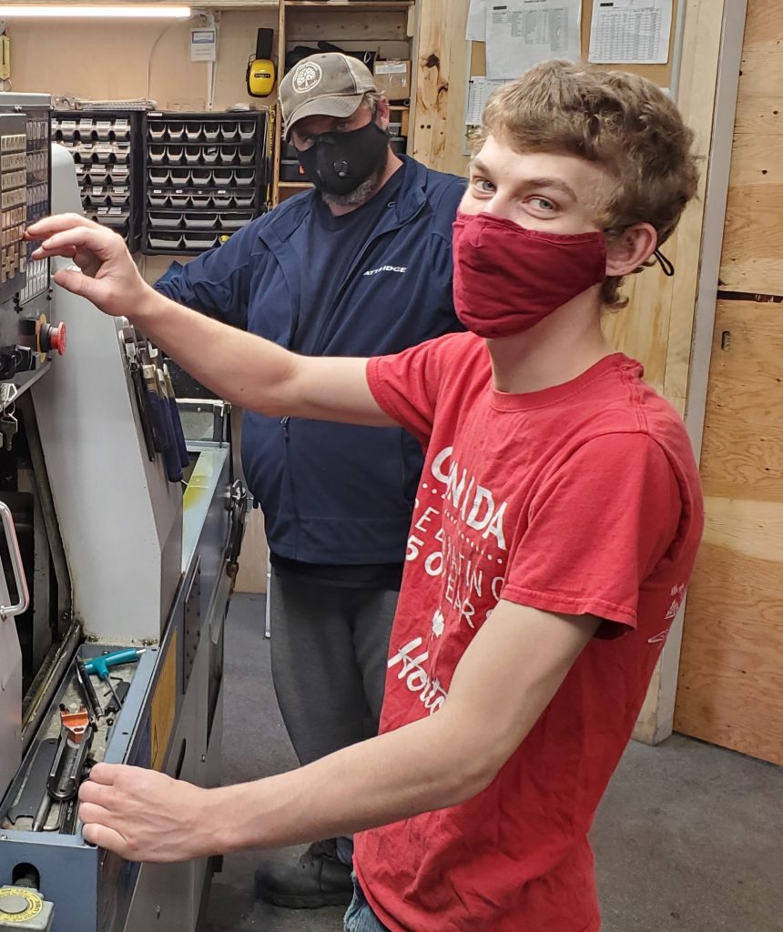 young workers smiling with COVID masks